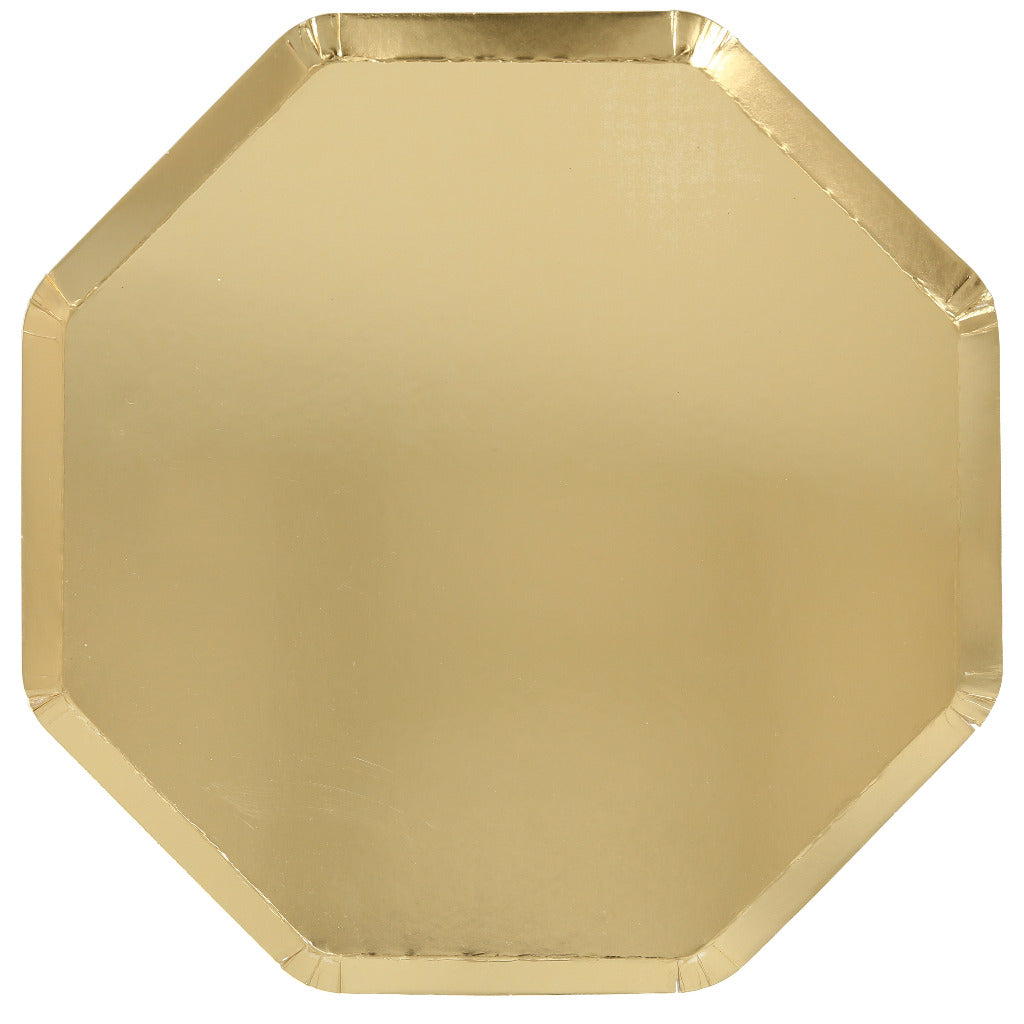 Gold octogonal paper plate on a white background.