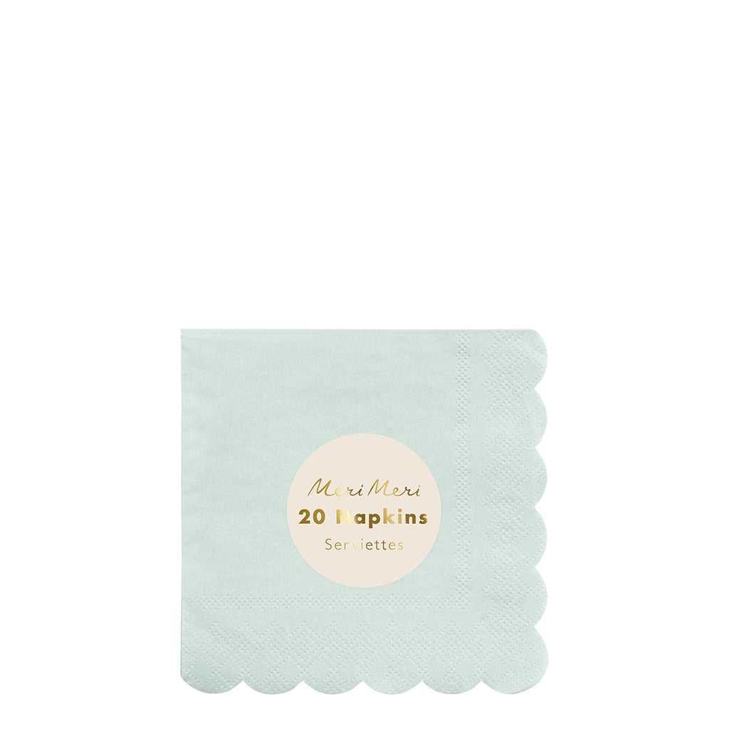 Meri Meri eco napkin in mint have scalloped edge on 2 sides.