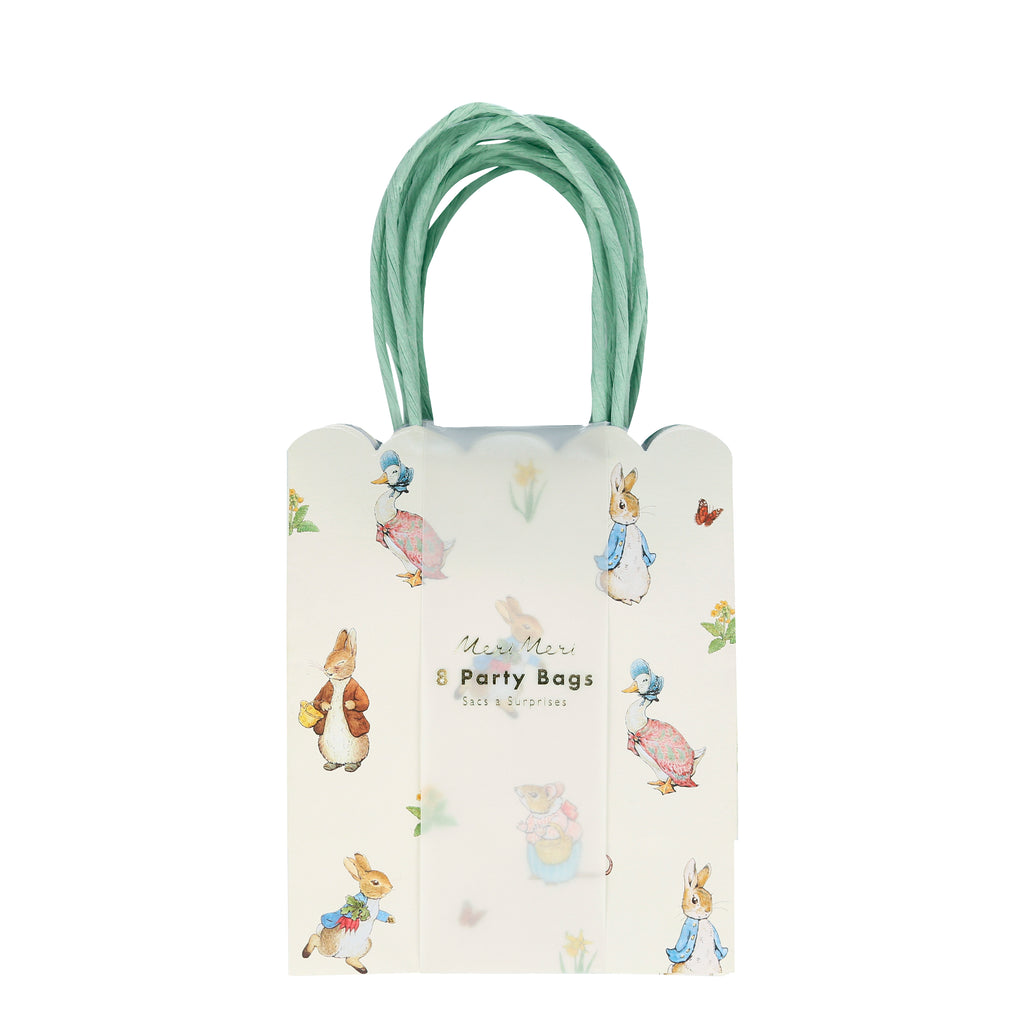 Delight your guests with these charming party bags featuring the wonderful Peter Rabbit and friends. They are beautifully designed with scallop edges and colourful handles.