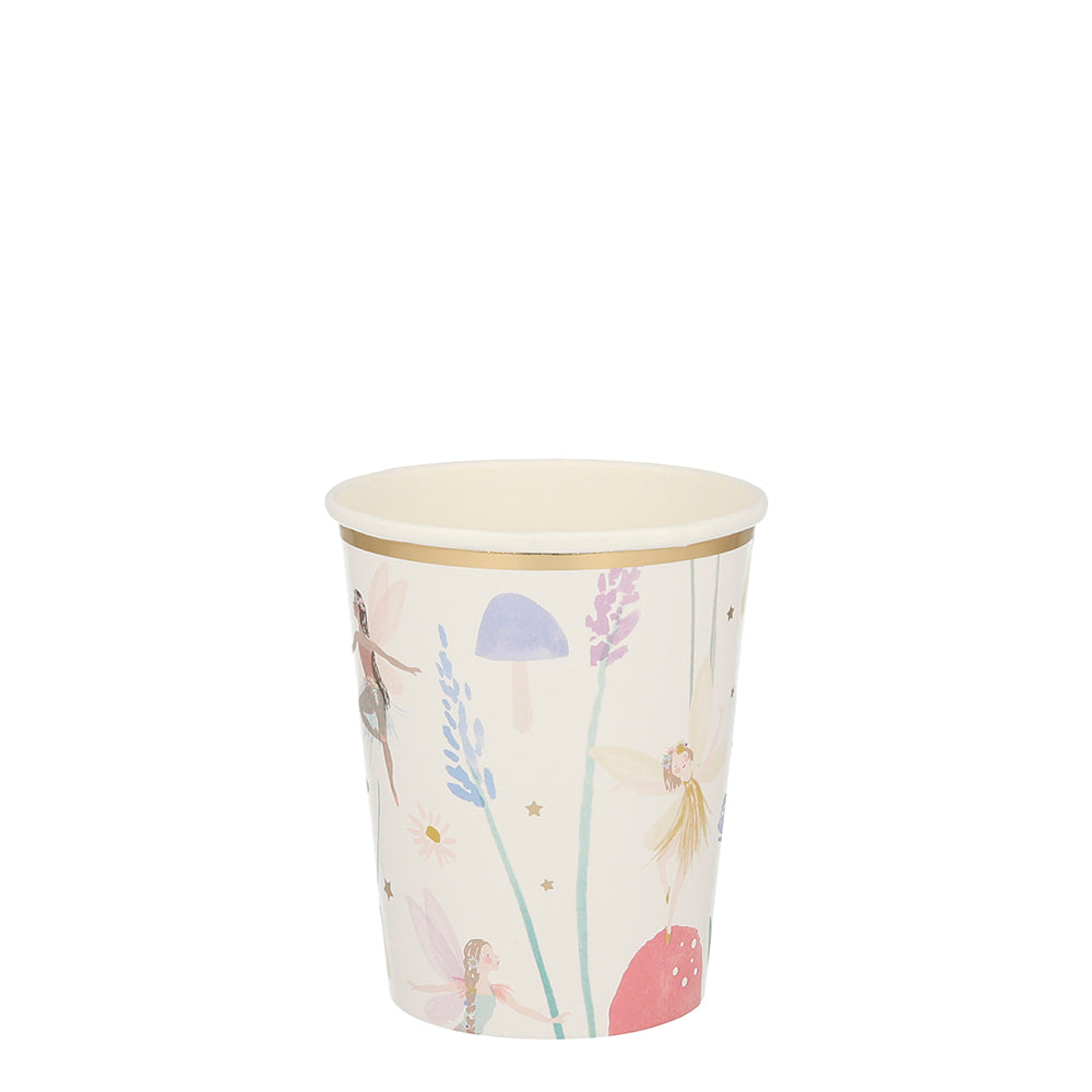 paper cup with watercolour fairies with their wings open standing on a toadstool. There are gold stars and lavender stalks in pastel colours.