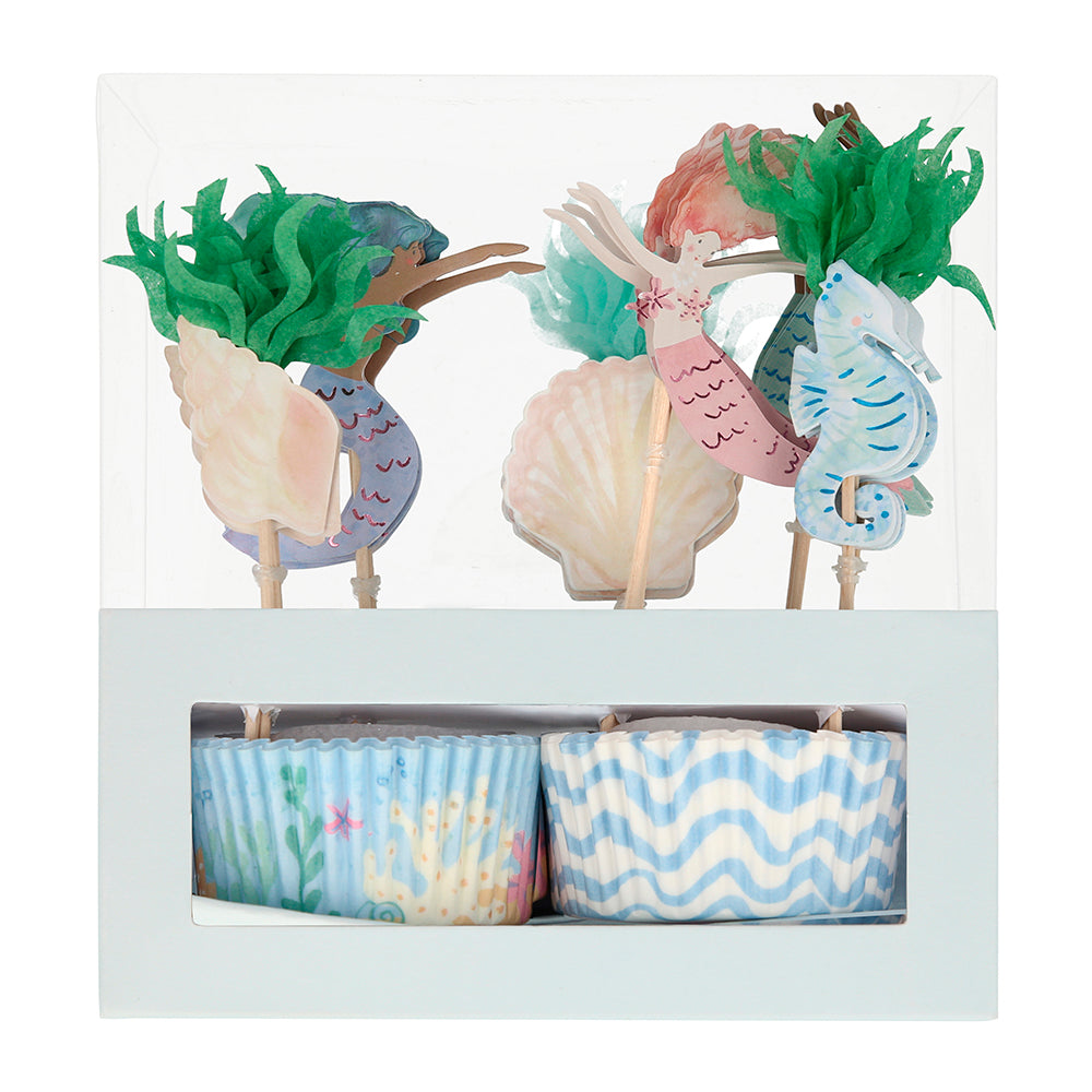 Make your cupcakes a highlight of your party with this fantastic mermaid cupcake kit. It includes 24 toppers, with 6 designs including beautiful mermaids, a seahorse and seaweed. The 24 cupcake cases feature 2 charming coordinating designs. The kit is presented in a special box, which makes a delightful gift.
